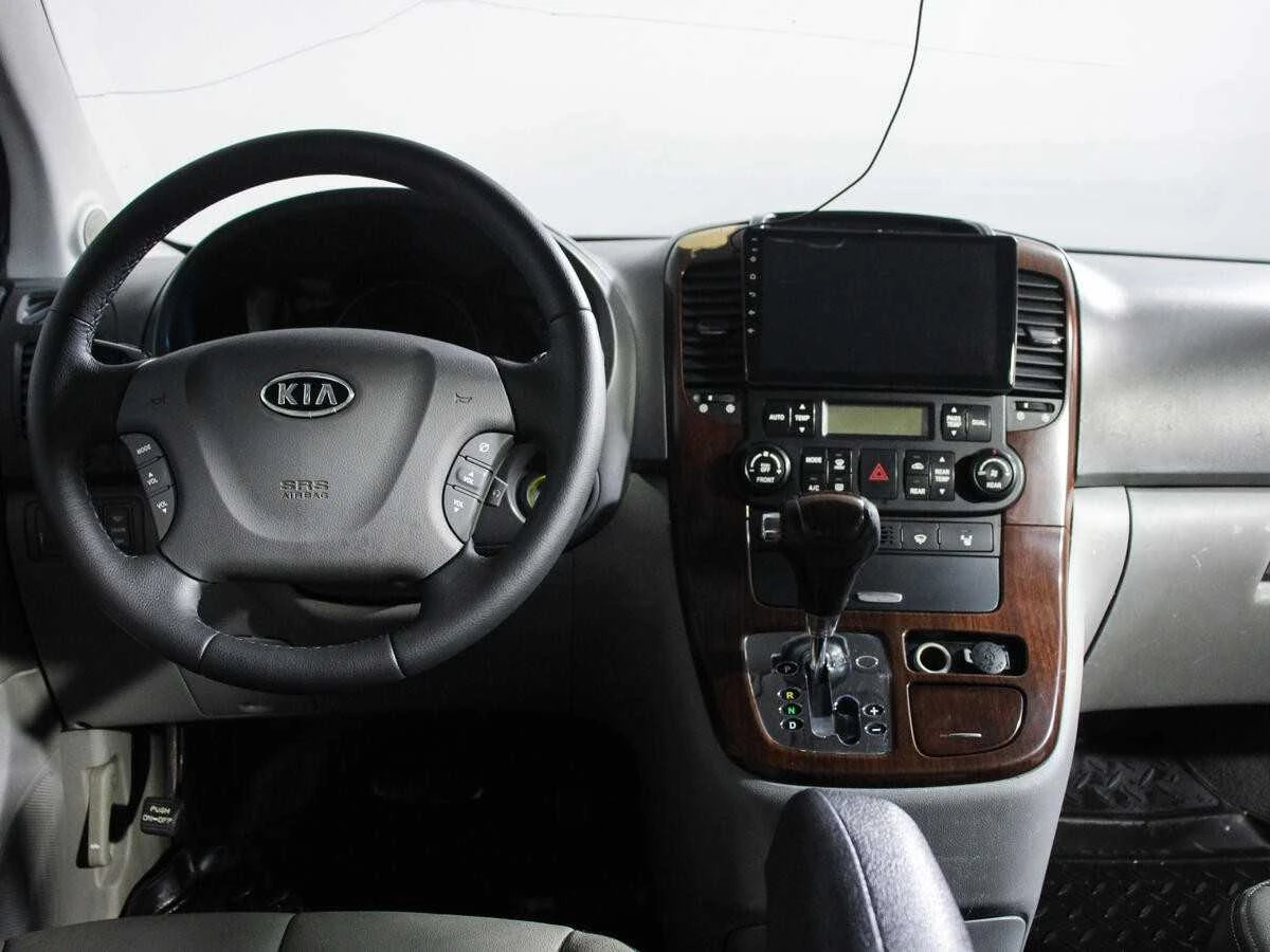 KIA Carnival, Коричневый, 2009, Автоматическая, 192 л.с., цена от 448 000 руб.